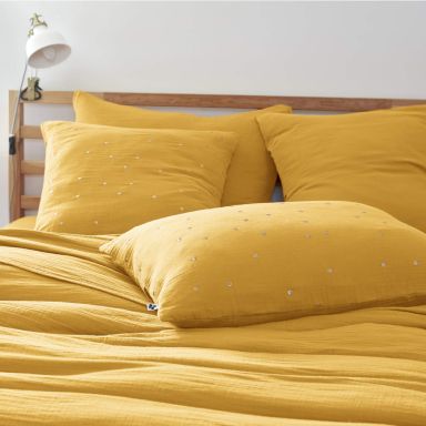 Taie d'oreiller à pois brodés double gaze de coton jaune safran 60x60 cm