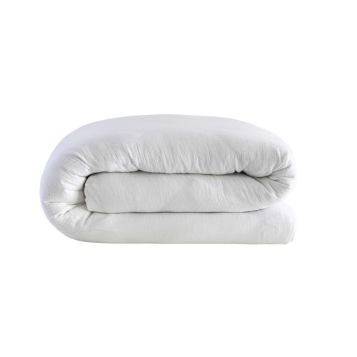 Housse de couette 260x240 blanc en gaze de coton pliée pour montrer la souplesse du tissu