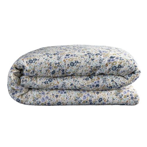 Détail du textile en pur coton de la parure fleur révélant la finesse des motifs floraux