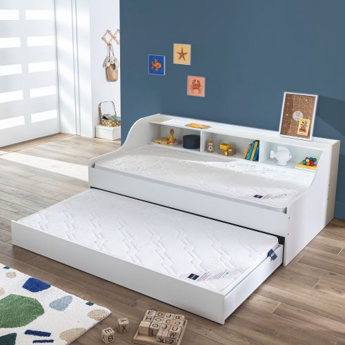 Matelas pour lit tiroir en mousse ferme Bultex installé dans un lit gigogne enfant.