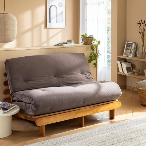 Matelas futon en coton ferme tissu velours côtelé Terre de Nuit sur un sommier banquette en bois.