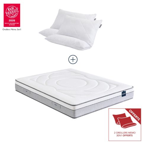 Vue en angle du matelas hybride Bultex Move accompagné de ses deux oreillers offerts.