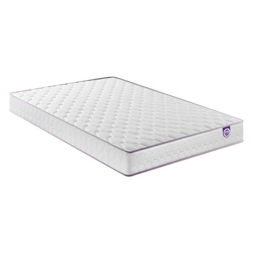 Matelas en ressorts ensachés NATTY Merinos installé sur un sommier tapissier dans une chambre moderne