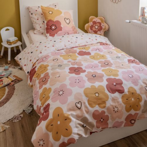 Lit enfant habillé d'une parure fleur coton aux motifs printaniers et coloris pastels