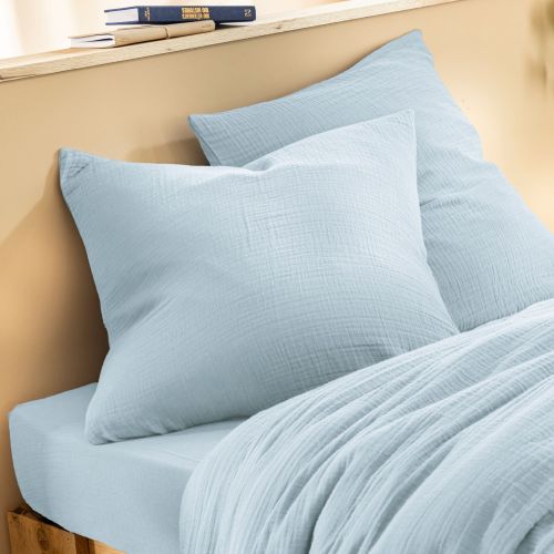 Harmonie de couleurs sur un lit avec taie oreiller gaze de coton sans repassage