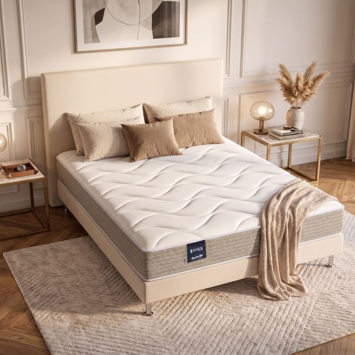 Matelas en mousse HR ferme Dunlopillo Tulipe 2 mis en situation dans une chambre moderne.