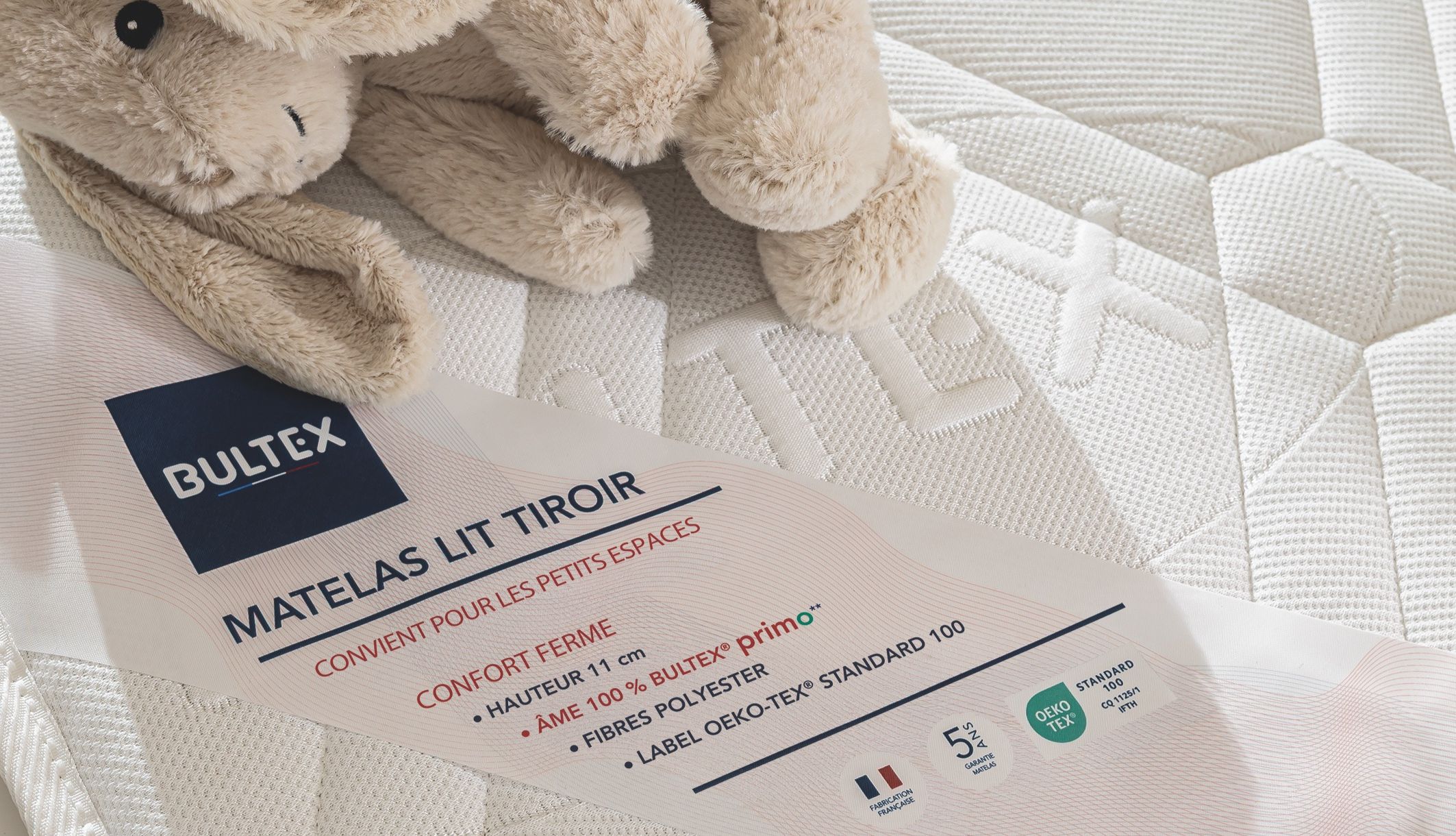 Zoom sur l&#039;étiquette du Matelas pour lit tiroir en mousse ferme Bultex : confort ferme, 11cm, Oeko-Tex.