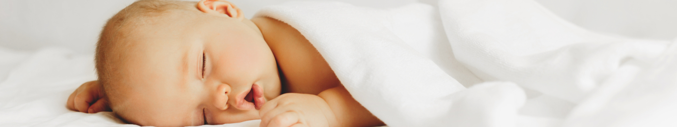 Bébé dormant dans sa couette Bébé dormant dans sa couette