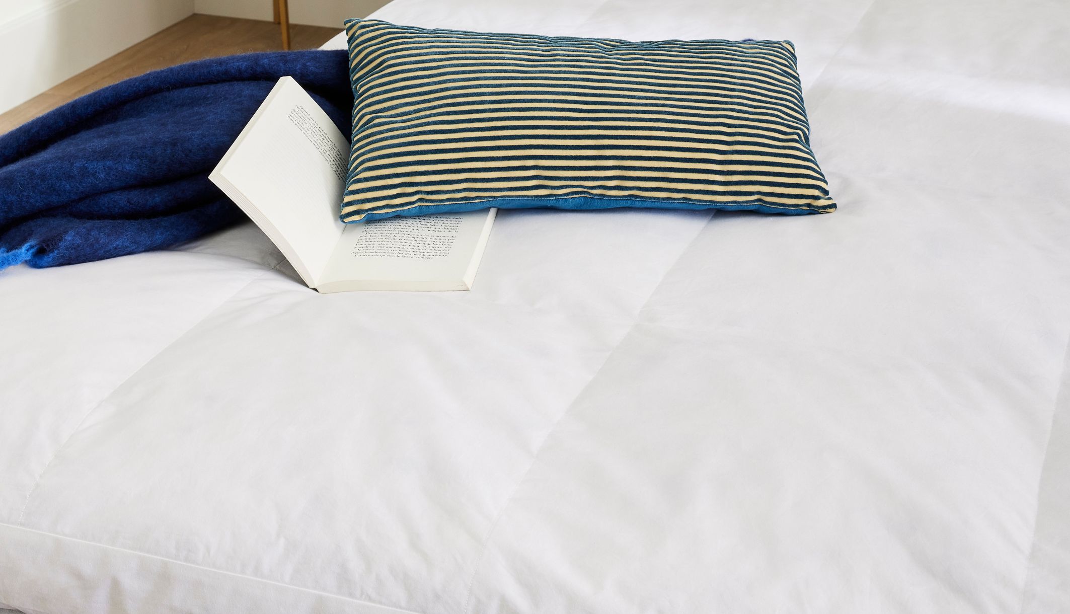 Surmatelas en duvet Rêve mis sur un lit, confortable et moelleux